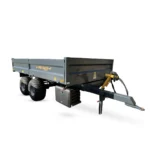Grå tippvagn 8 ton dropside med fällbara lämmar